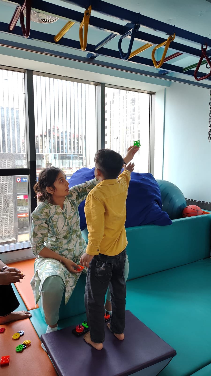 Dr. Sonali Doshi directing a pediatric therapy assessment